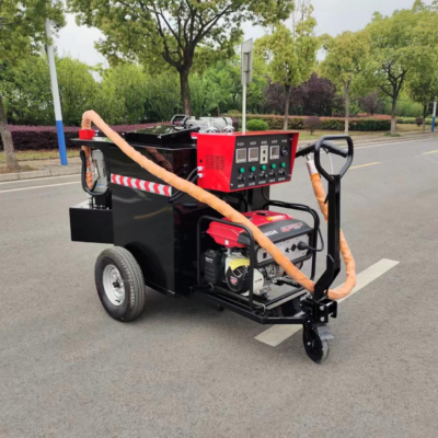 Hand-pushed traction caulking machine